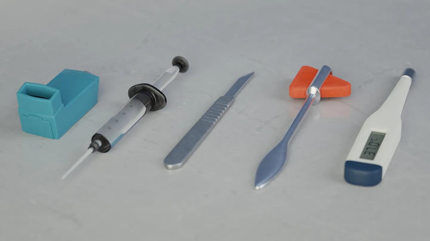 Syringe, scalpel, thermometer, eyedropper, reflex hammer, and stethoscope models.